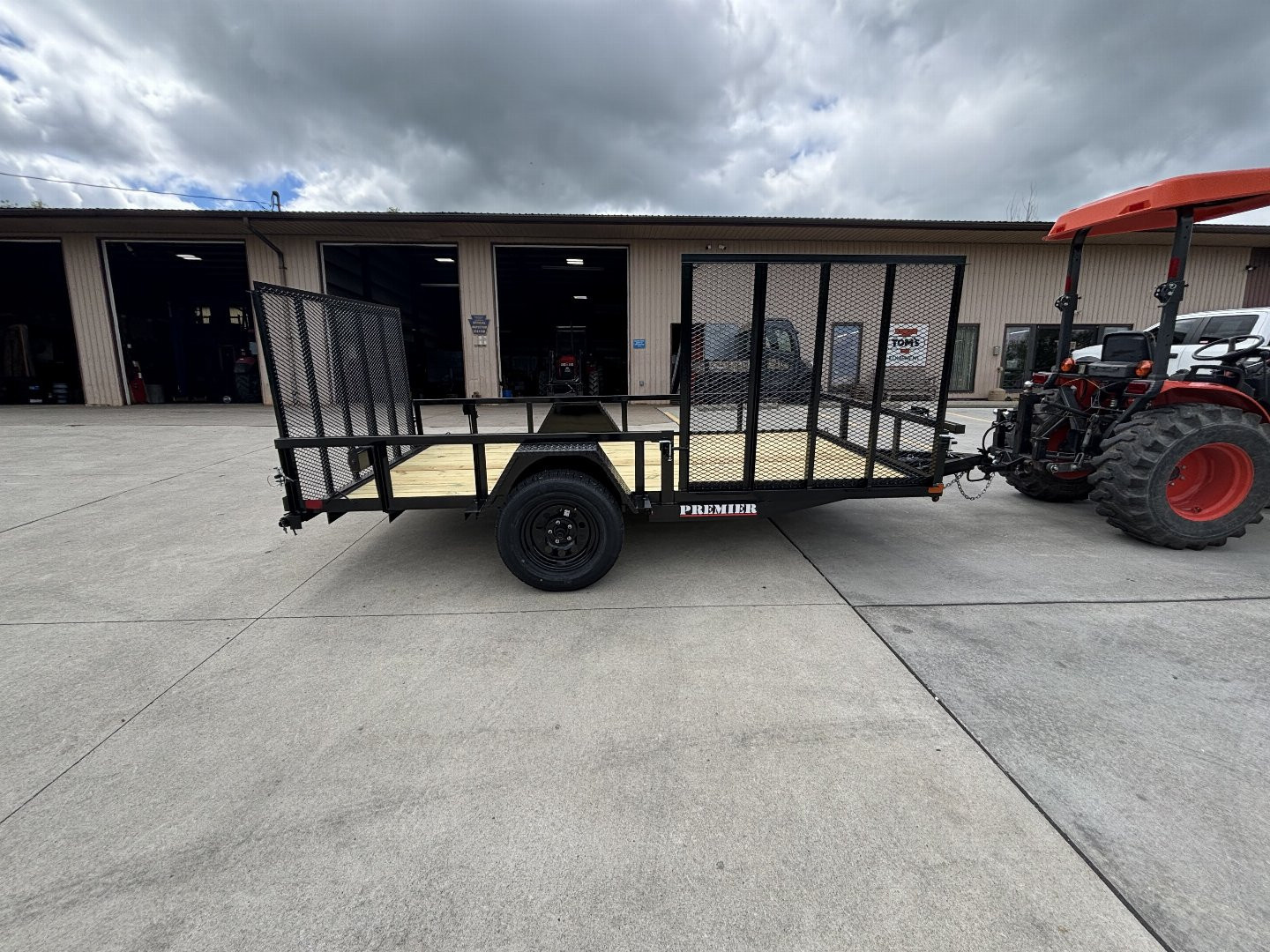 New 2025 Premier Trailers 76"X12' Utility Trailer W/ Side Load Ramp - 2995# GVWR