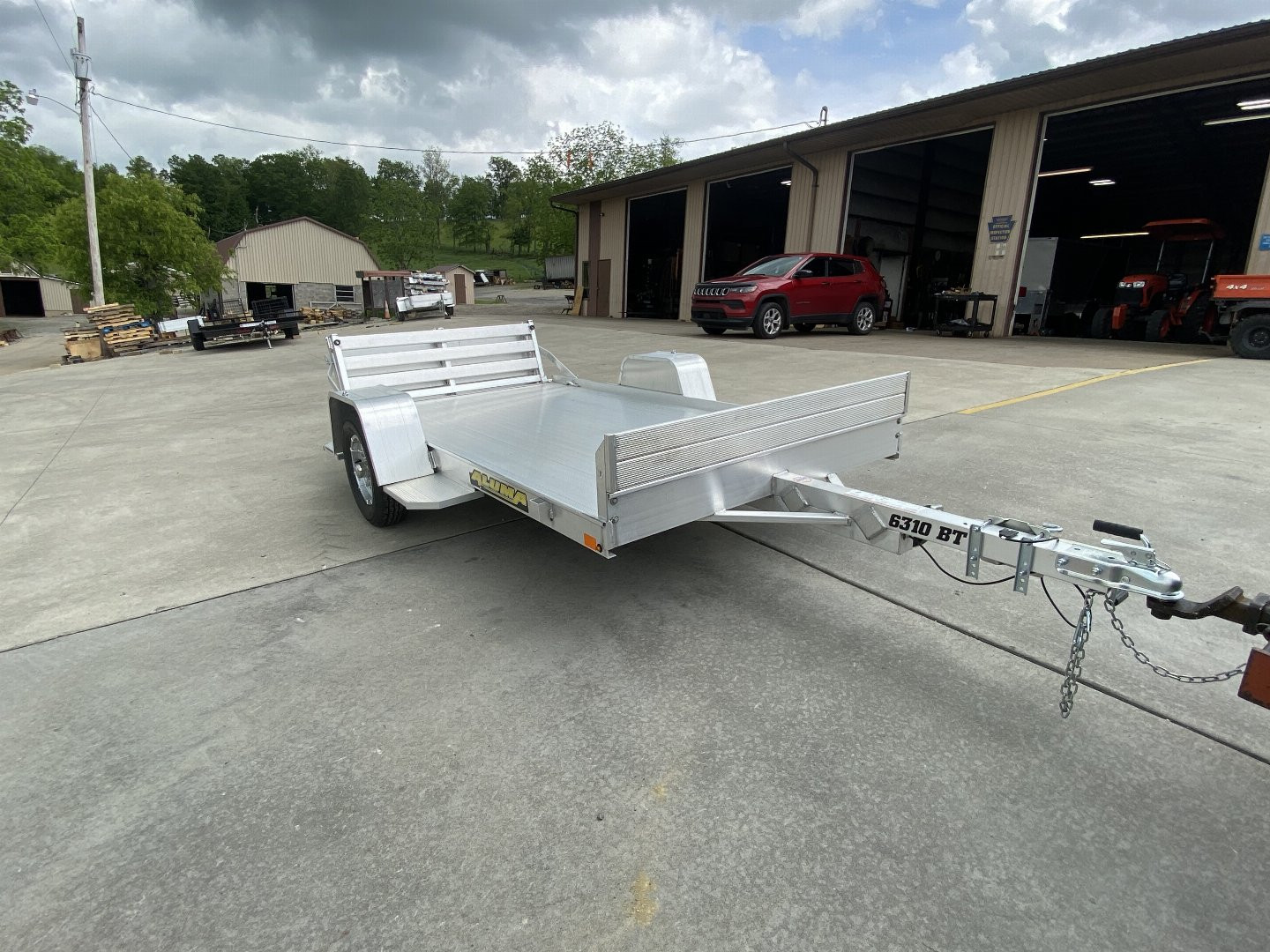 New 2026 Aluma Trailers 6310S-BT Utility Trailer w/ Bi-Fold Gate - 2000# GVWR