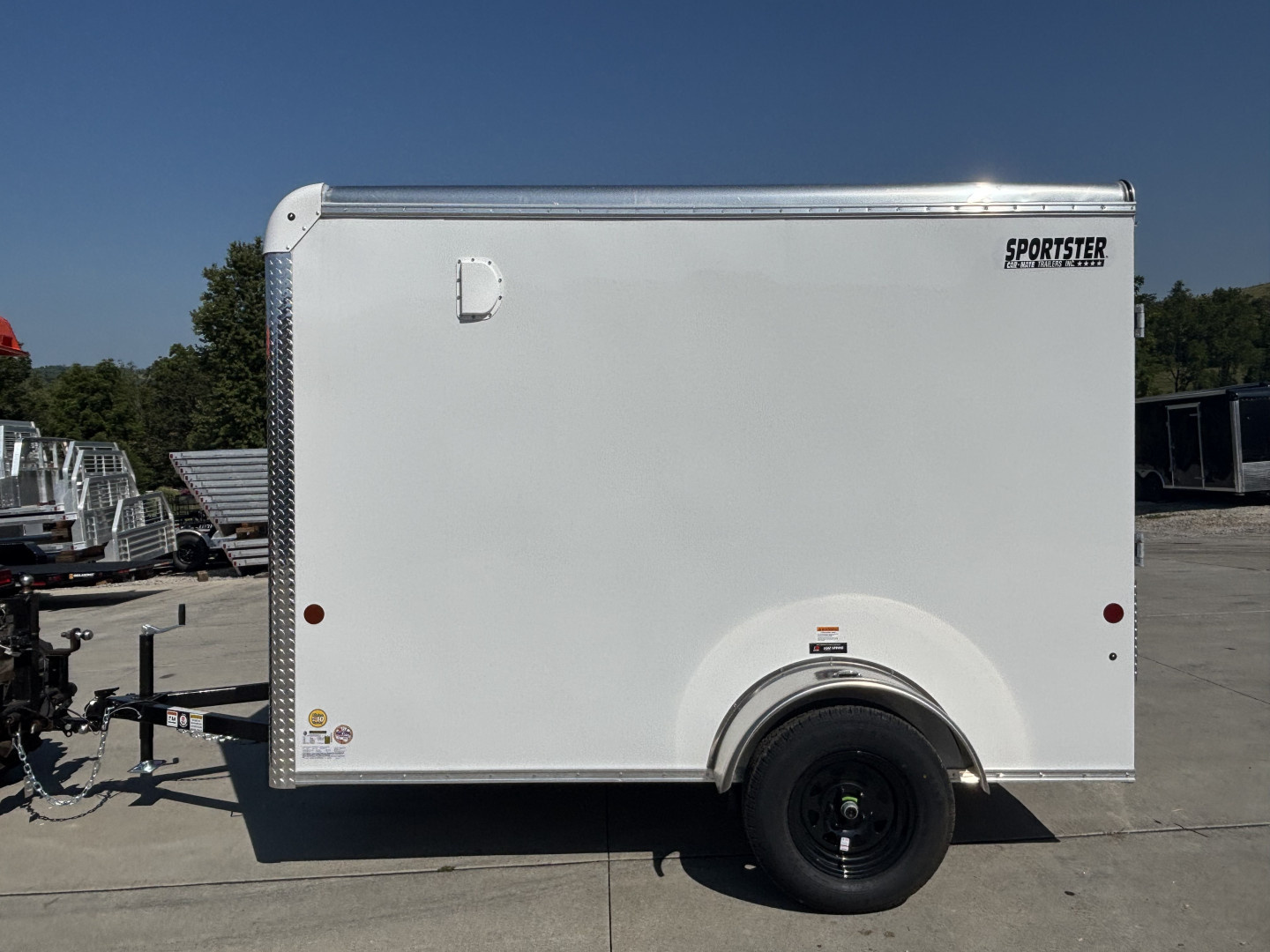 New 2025 Car Mate Trailers 6x10 Sportster Enclosed Trailer - Crystal White w/ Ramp - 2990# GVWR