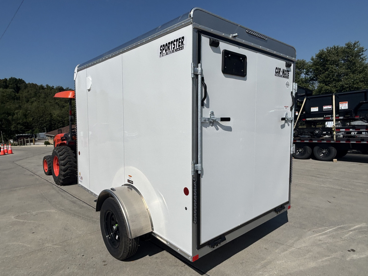 New 2025 Car Mate Trailers 6x10 Sportster Enclosed Trailer - Crystal White w/ Ramp - 2990# GVWR