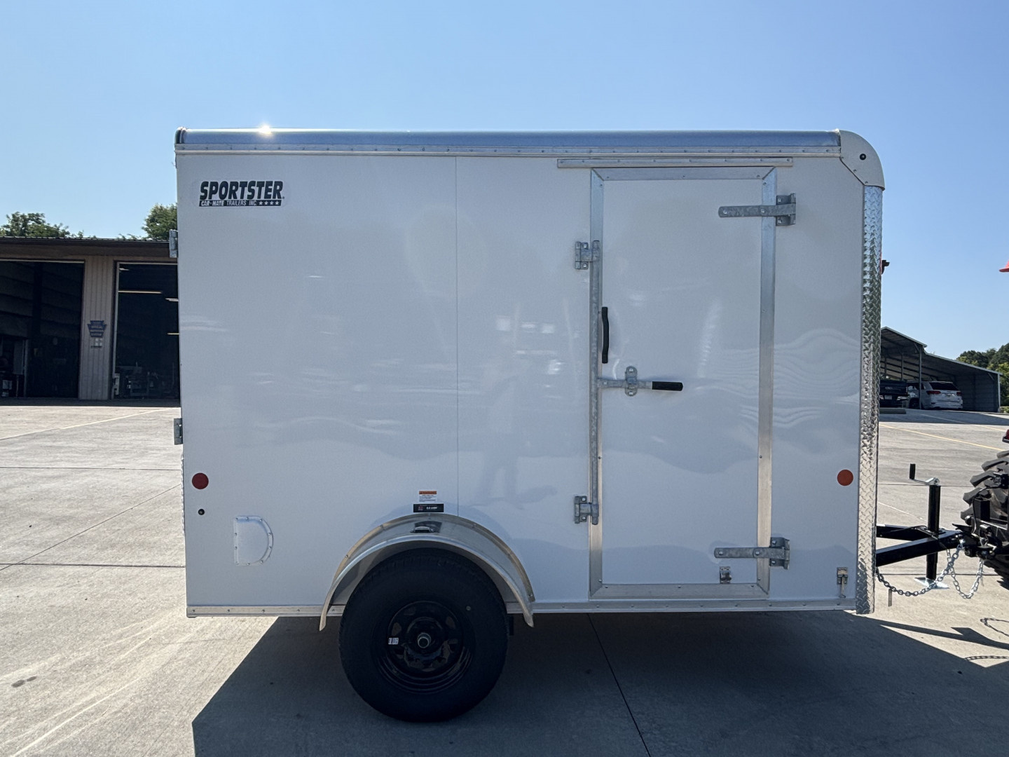 New 2025 Car Mate Trailers 6x10 Sportster Enclosed Trailer - Crystal White w/ Ramp - 2990# GVWR