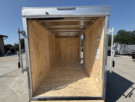 New 2025 Car Mate Trailers 6x10 Sportster Enclosed Trailer - Crystal White w/ Ramp - 2990# GVWR