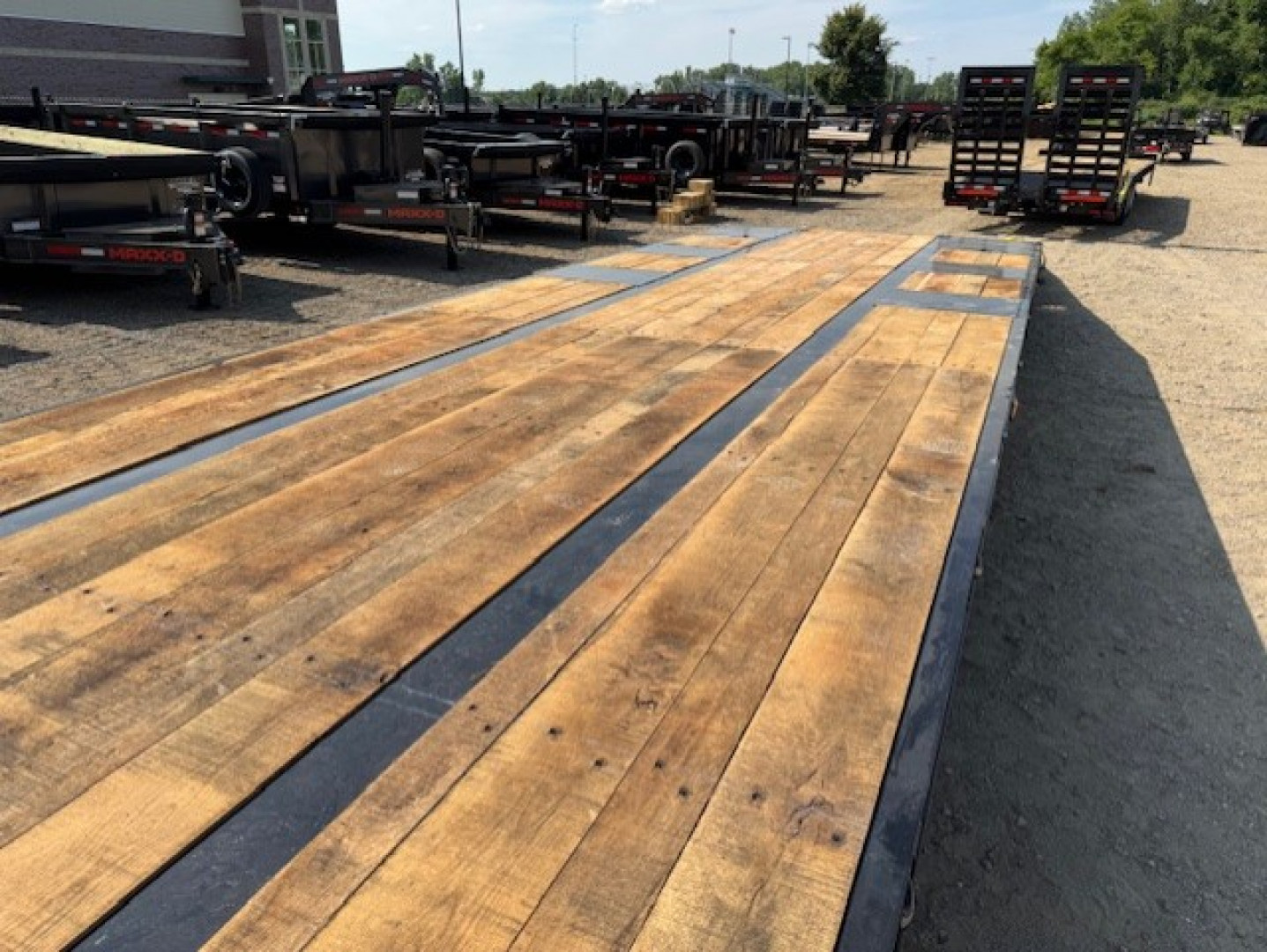 New 2026 Behnke FB8X33SDPT-50L Flatbed Trailer