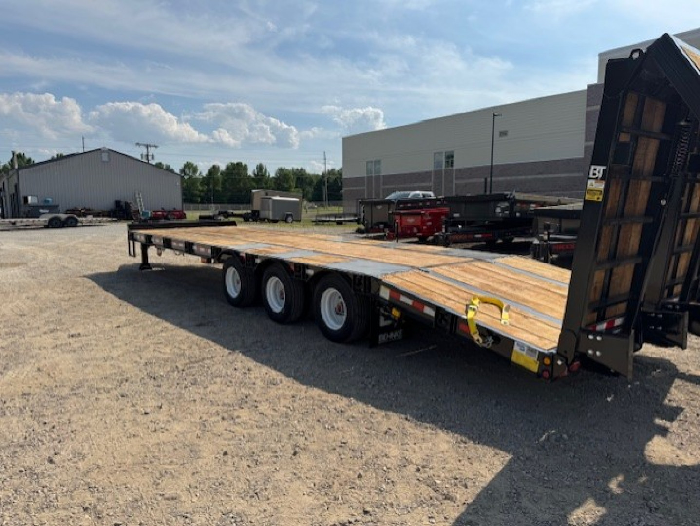 New 2026 Behnke FB8X33SDPT-50L Flatbed Trailer