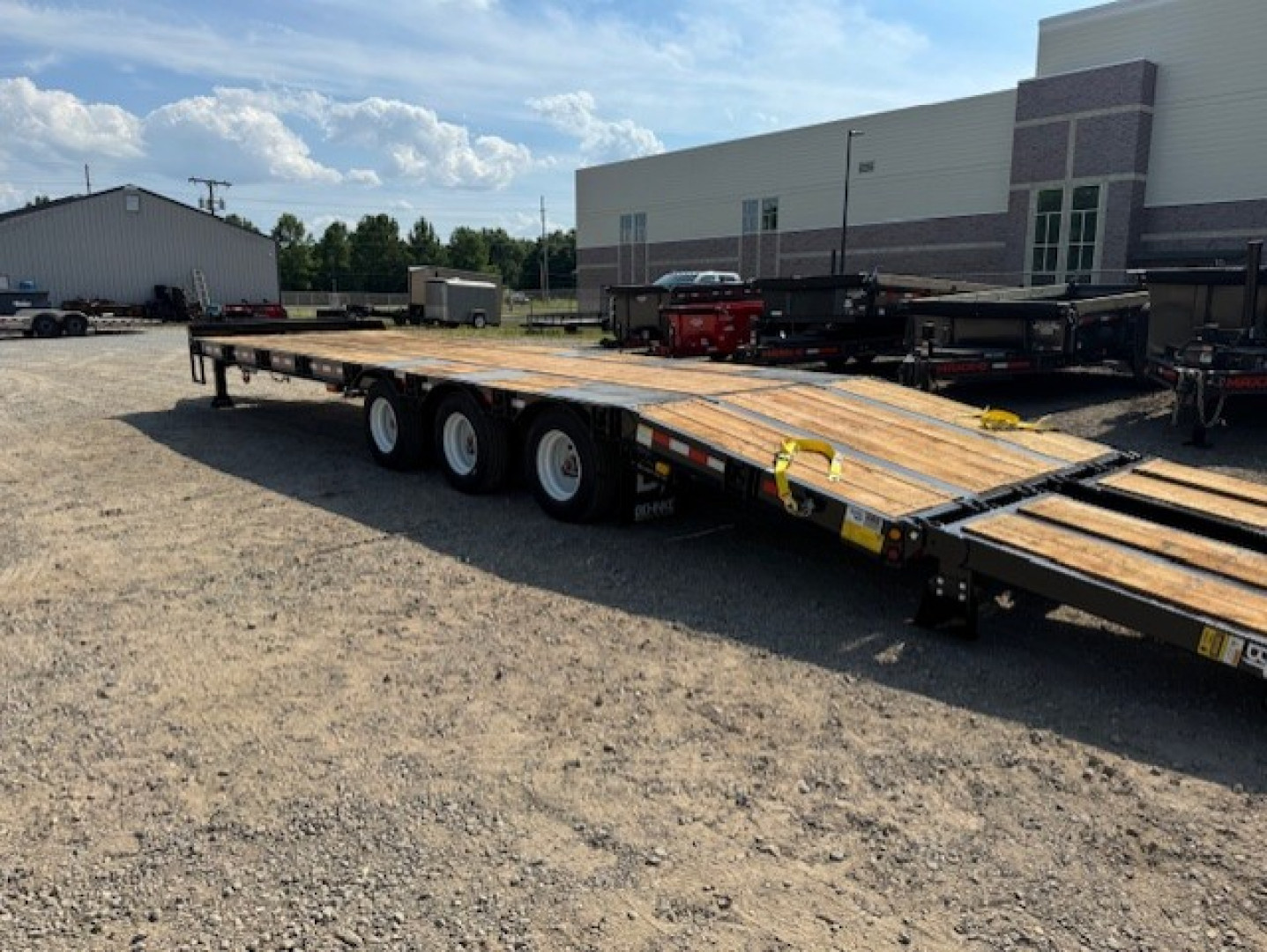 New 2026 Behnke FB8X33SDPT-50L Flatbed Trailer