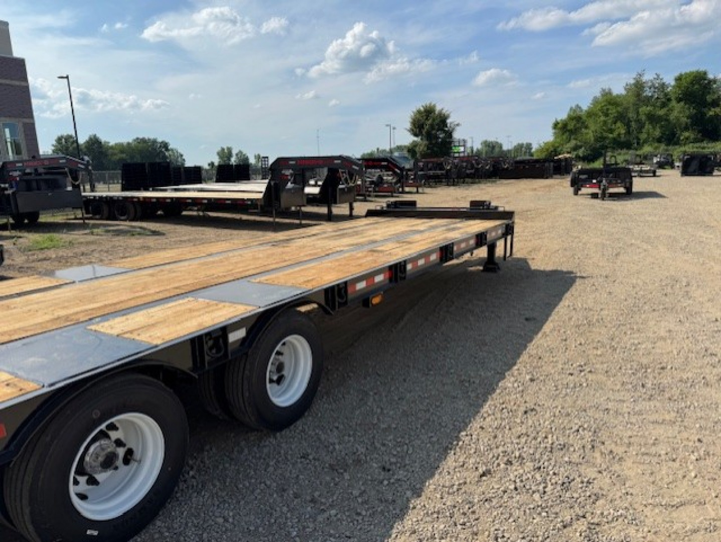 New 2026 Behnke FB8X31SDPT-40L Flatbed Trailer
