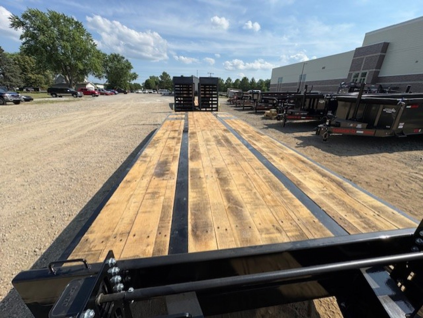 New 2026 Behnke FB8X31SDPT-40L Flatbed Trailer