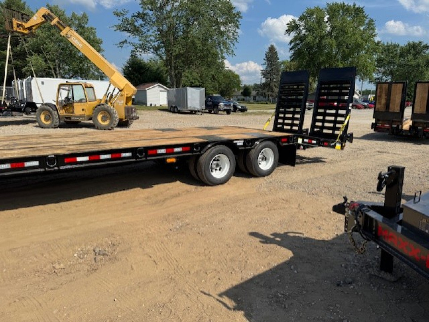 New 2026 Behnke FB8X31SDPT-40L Flatbed Trailer
