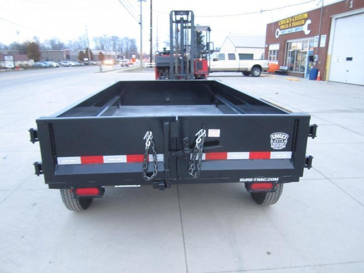 New Sure-Trac 62in x 10 LProfile Dump 7K Single Ram