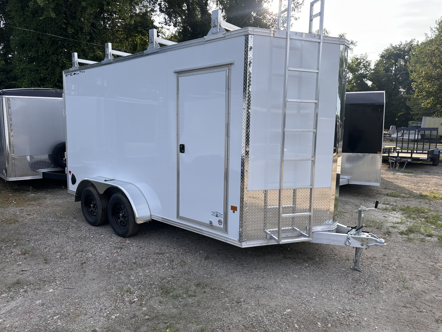 New 2025 STEALTH 7x14 Contractor Enclosed with ladder barn door