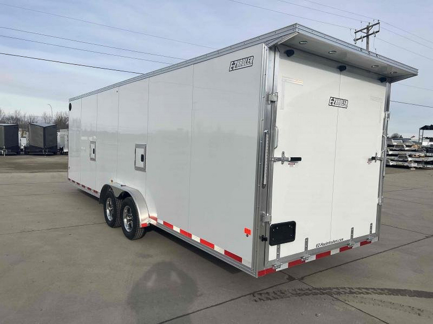 New 2024 Ez-Hauler7.5X29 Enclosed Snowmobile Trailer - 847
