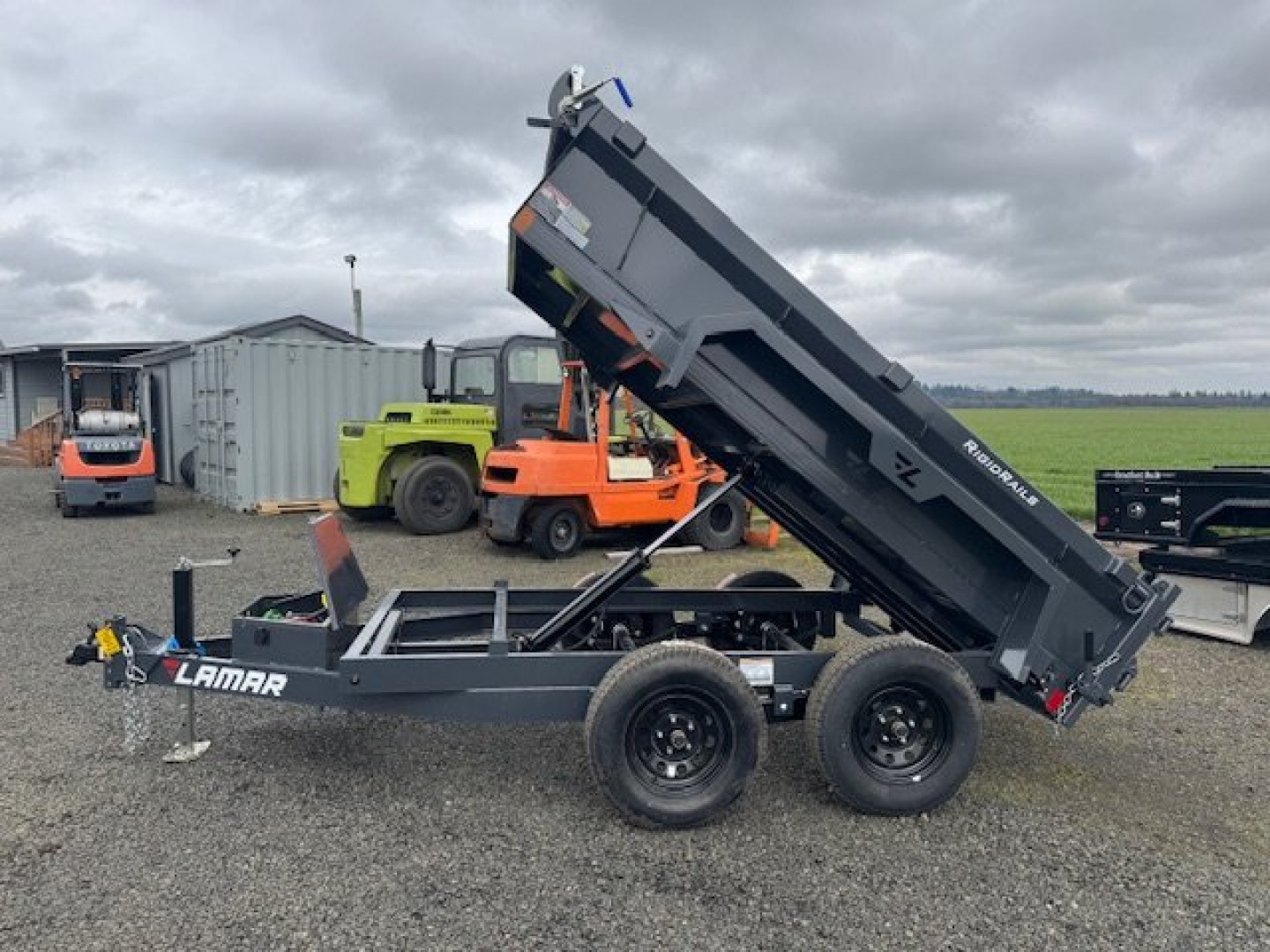 New 2025 Lamar Trailers Inc DS 60" X 10' 7k Dump Trailer 18" SIDES