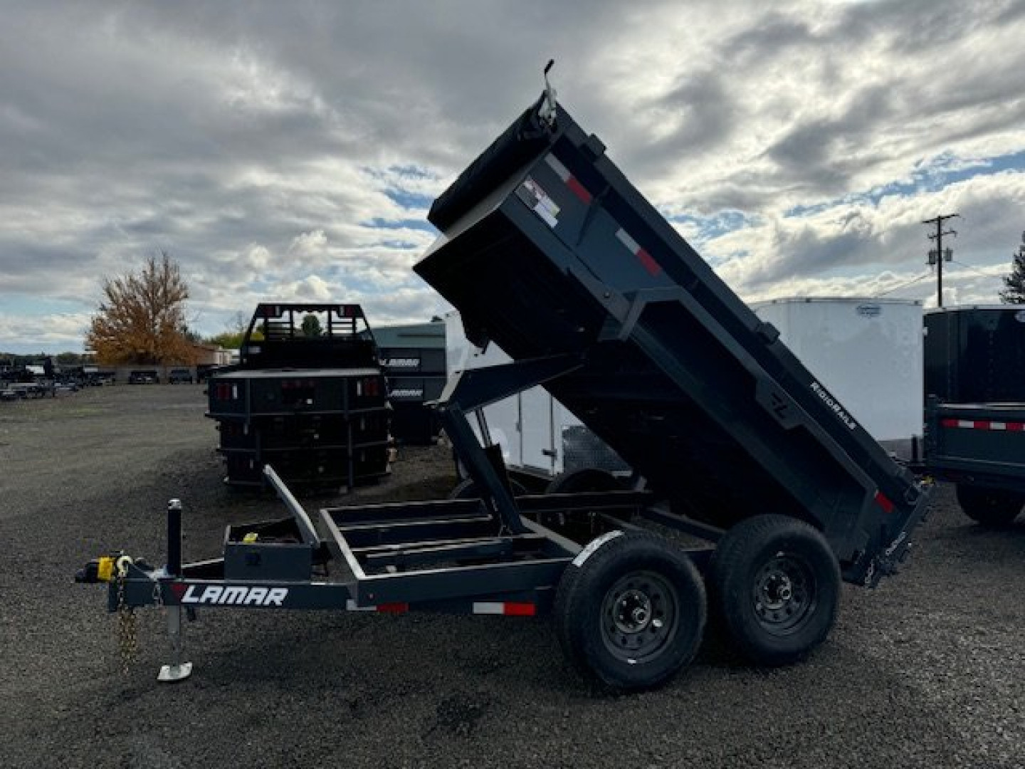 New 2025 Lamar Trailers DM 77"x 10'/10K DUMP Dump Trailer 18" SIDES