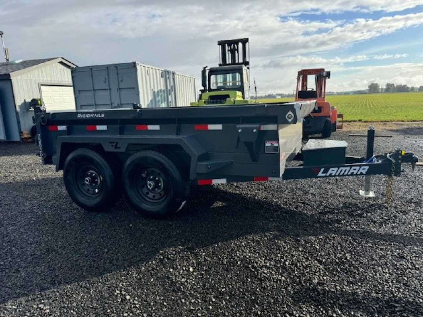 New 2025 Lamar Trailers 77"X10'/10K Dump Trailer 18" SIDES