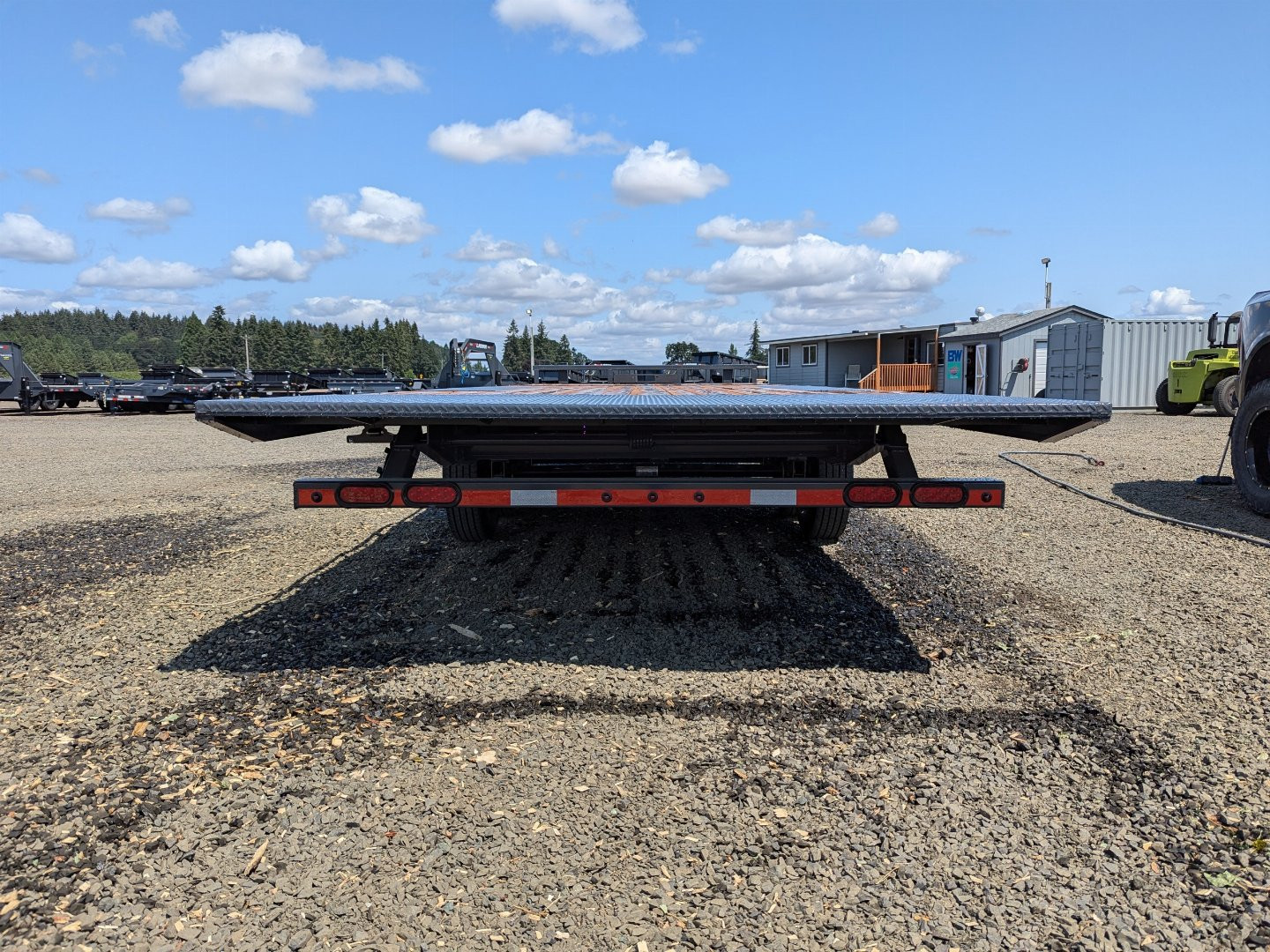 New 2025 LAMAR TRAILERS FA 102x24 14K Tilt Trailer