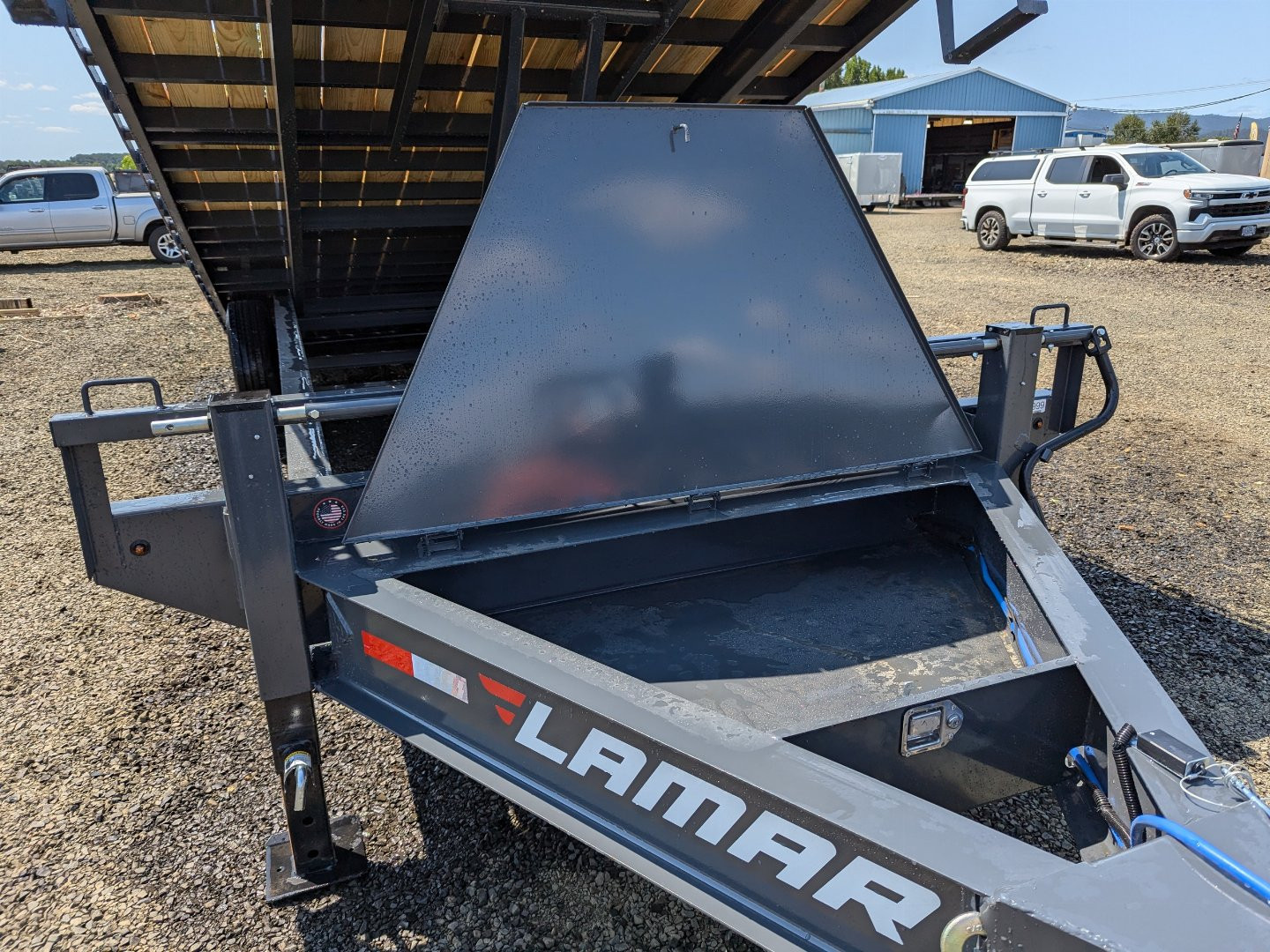 New 2025 LAMAR TRAILERS FA 102x24 14K Tilt Trailer