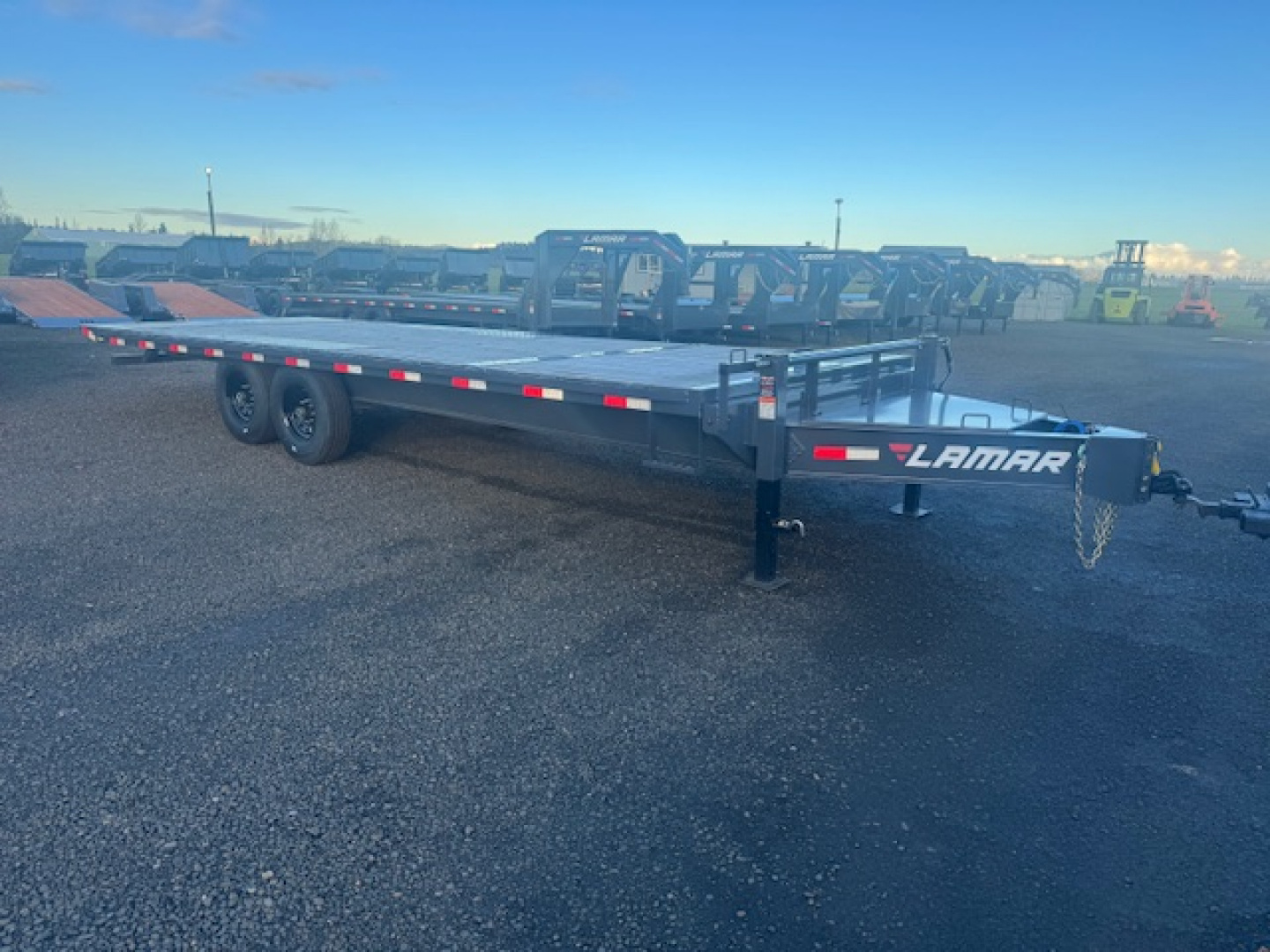 New 2025 LAMAR TRAILERS FA 102" x 24' 14K Tilt Trailer