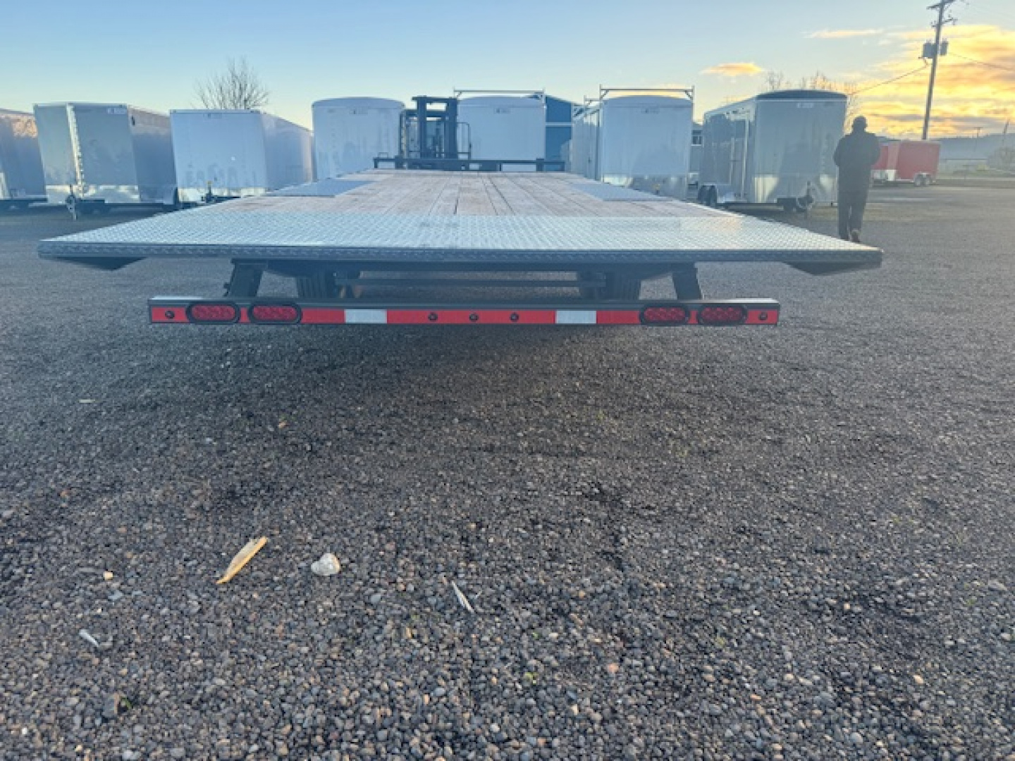 New 2025 LAMAR TRAILERS FA 102" x 24' 14K Tilt Trailer