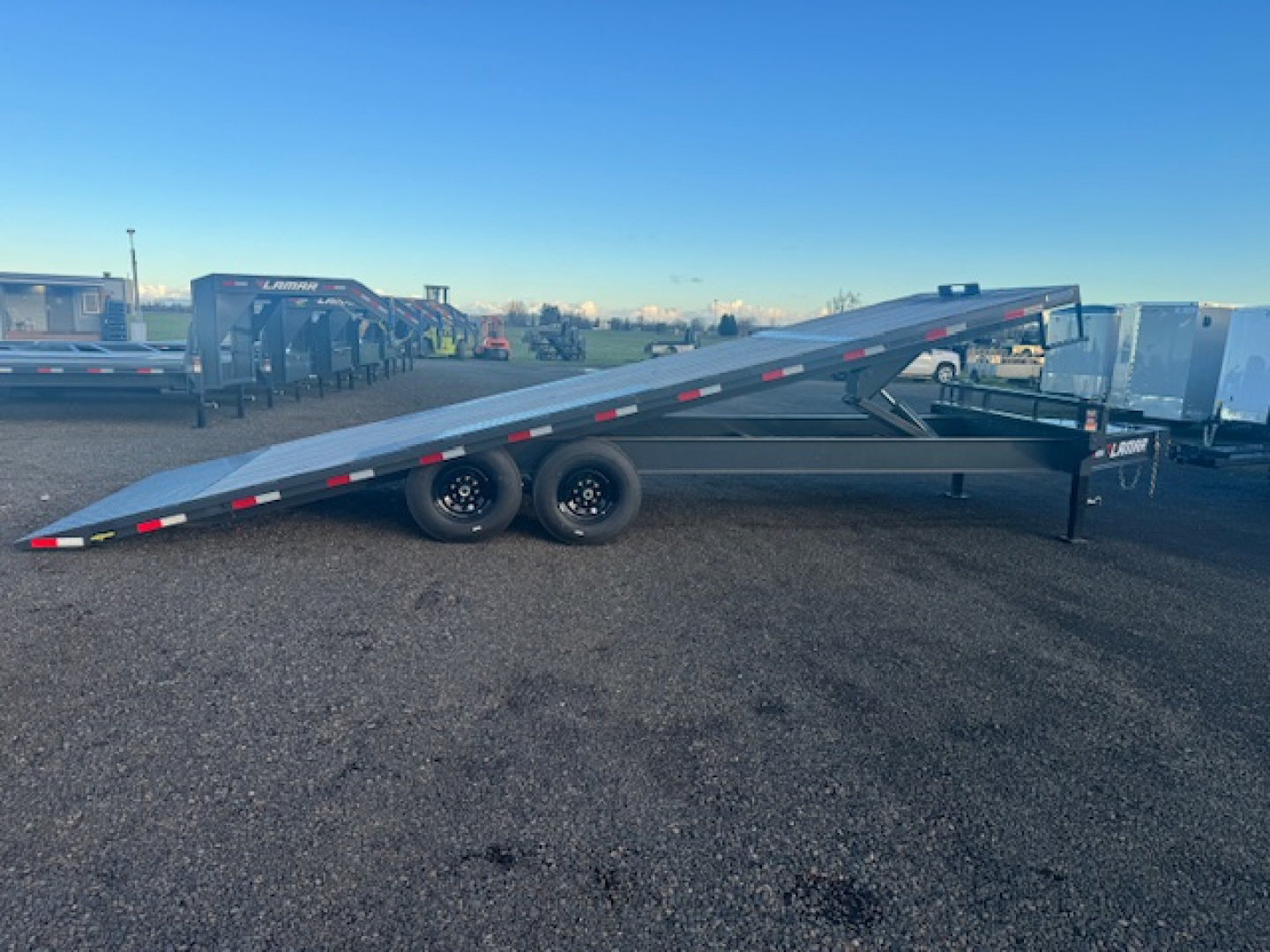 New 2025 LAMAR TRAILERS FA 102" x 24' 14K Tilt Trailer