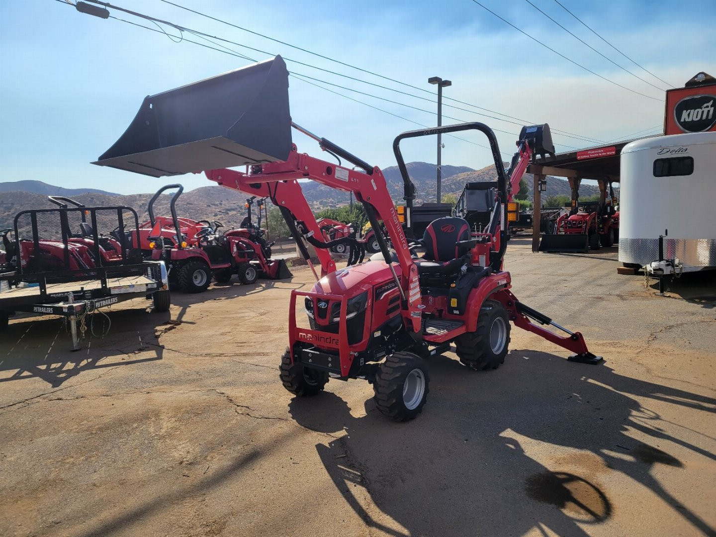 New 2024 Mahindra 1120 HST Loader and backhoe
