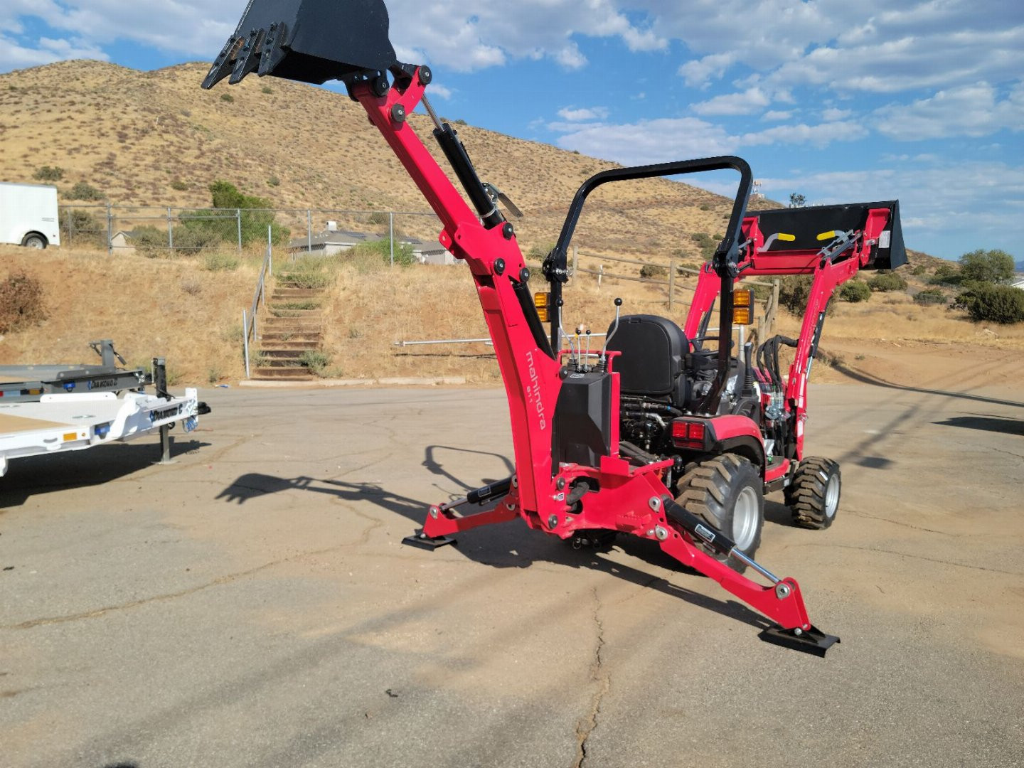 New 2024 Mahindra 1120 HST Loader and backhoe
