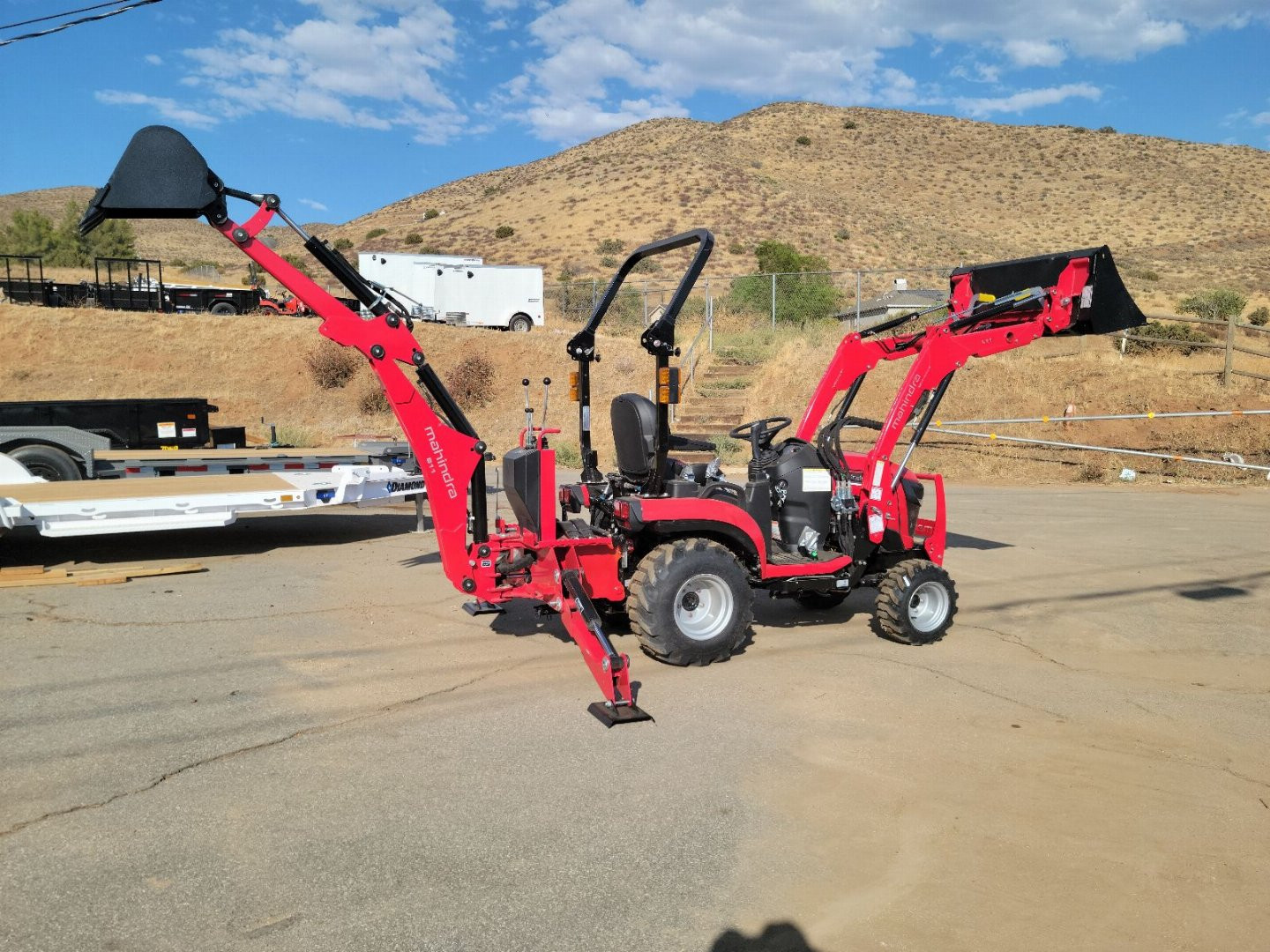 New 2024 Mahindra 1120 HST Loader and backhoe