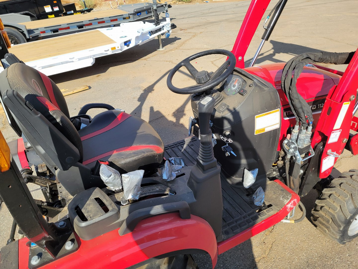 New 2024 Mahindra 1120 HST BUNDLE #1 Landscape Trailer