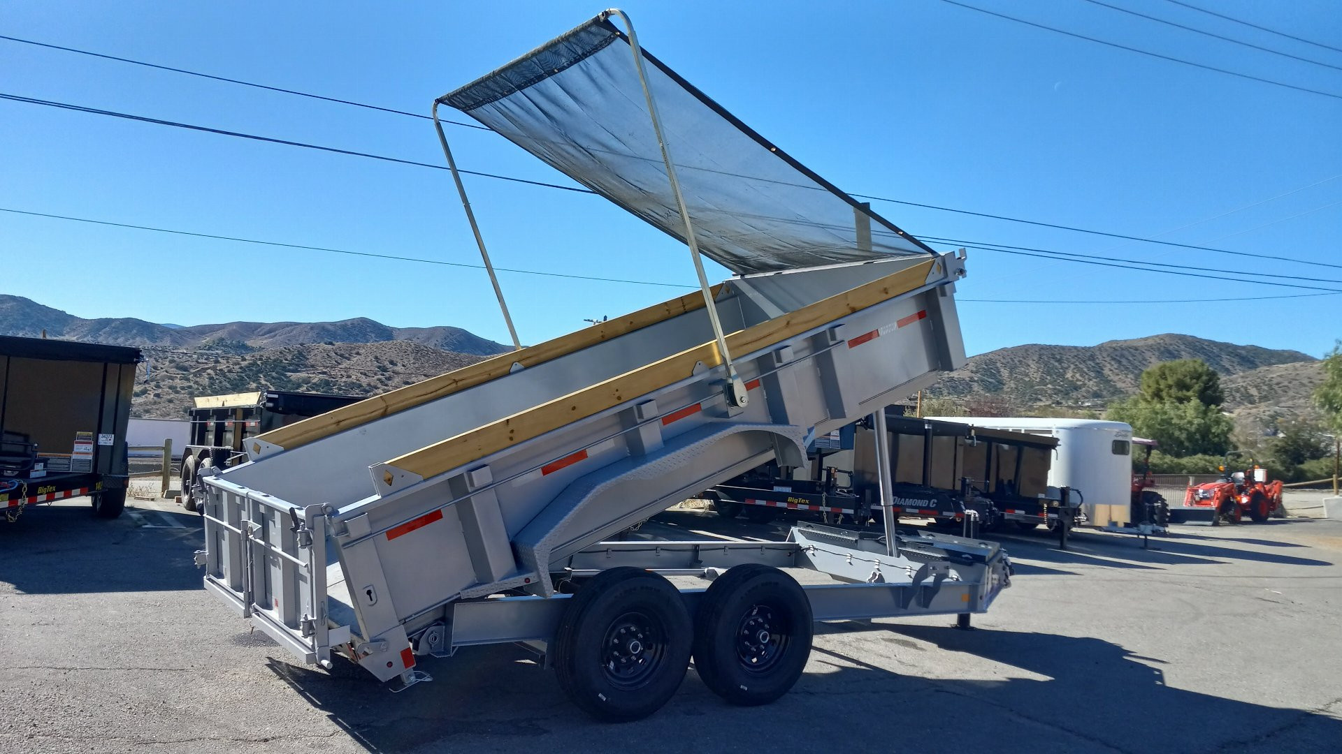 New 2025 Diamond C Trailers LPT 14X82-PACESETTER EDITION