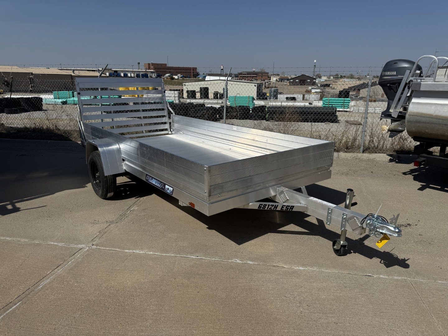 New 2025 Aluma 6812H-ESA-S-TG Utility Trailer