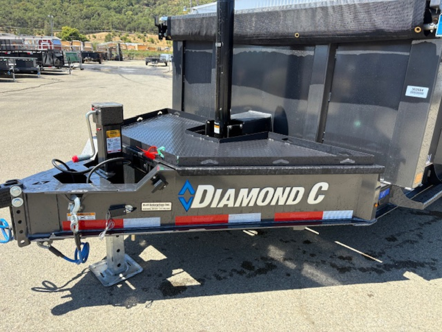 New 2025 Diamond C LPT207 82X14 LOW PROFILE 14K DUMP TRAILER 32" SIDES METALLIC GRAY