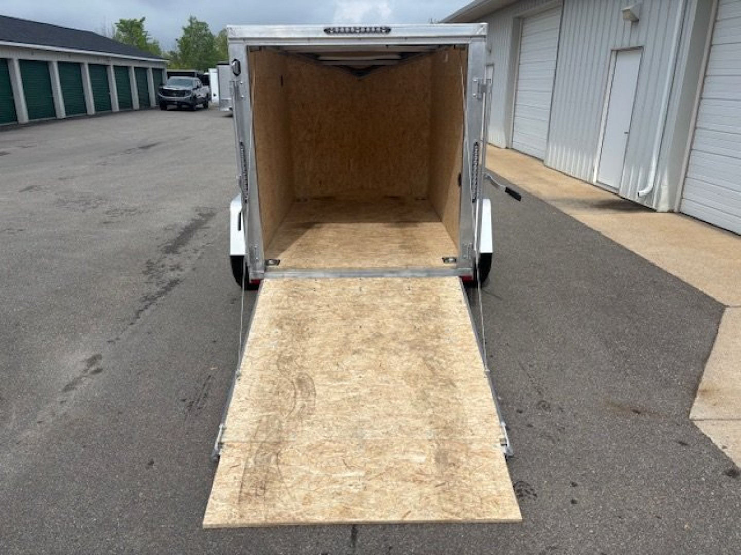 Used 2025 Lightning 5x8 Enclosed Aluminum Trailer