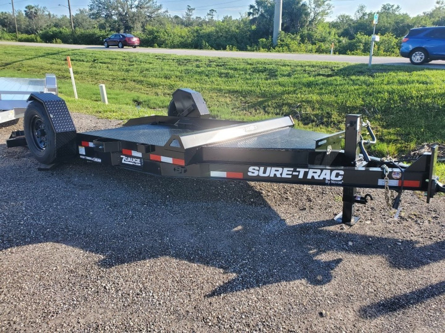 New 2025 Sure-Trac 7X12 SINGLE AXLE 7800 LB GVWR POWER DROP DECK Equipment Trailer