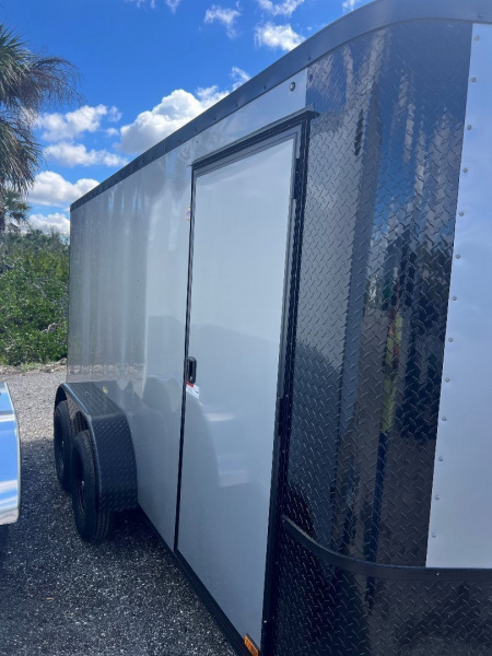 New 2025 Arising 7X14 TANDEM AXLE CARGO/ENCLOSED TRAILER WITH FULL TUBE FRAME/6'3" HEIGHT/REAR RAMP DOOR/BLACKOUT PACKAGE