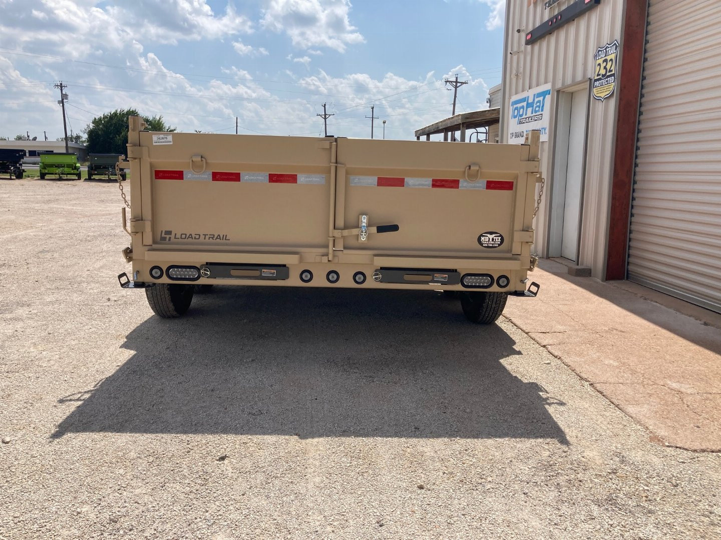 New 2026 Load Trail 14' x 83" Tandem Axle Low-Pro Dump Trailer (Coyote Tan)