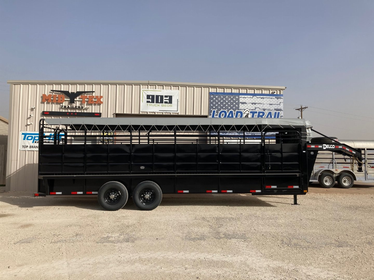 New 2025 Delco 24'x6'8" Gooseneck Stock Trailer