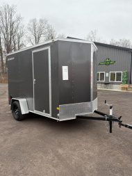 New 2025 Wells Cargo 6x10 Fasttrac Deluxe Cargo / Enclosed Trailer w/Ramp Door