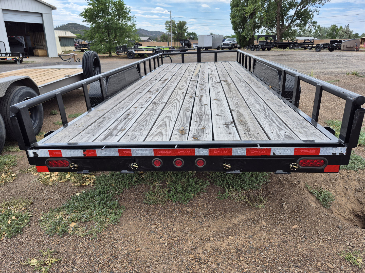 New 2025 Delco Tandem Axle Car Hauler/14,000 GVWR/83"x20'