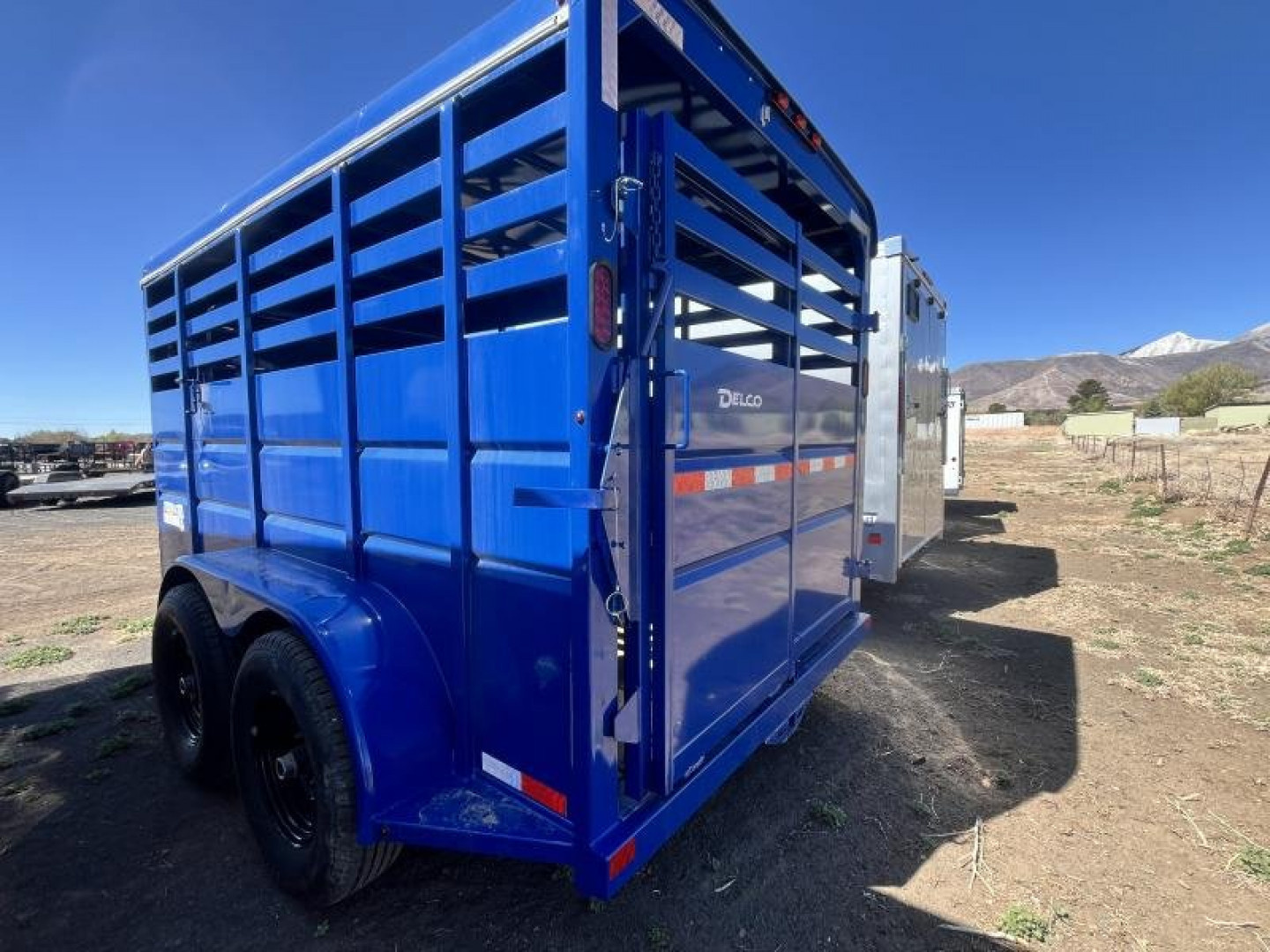 New 2025 Delco Tandem Axle Stock/12,000 GVWR/6'8"x14'