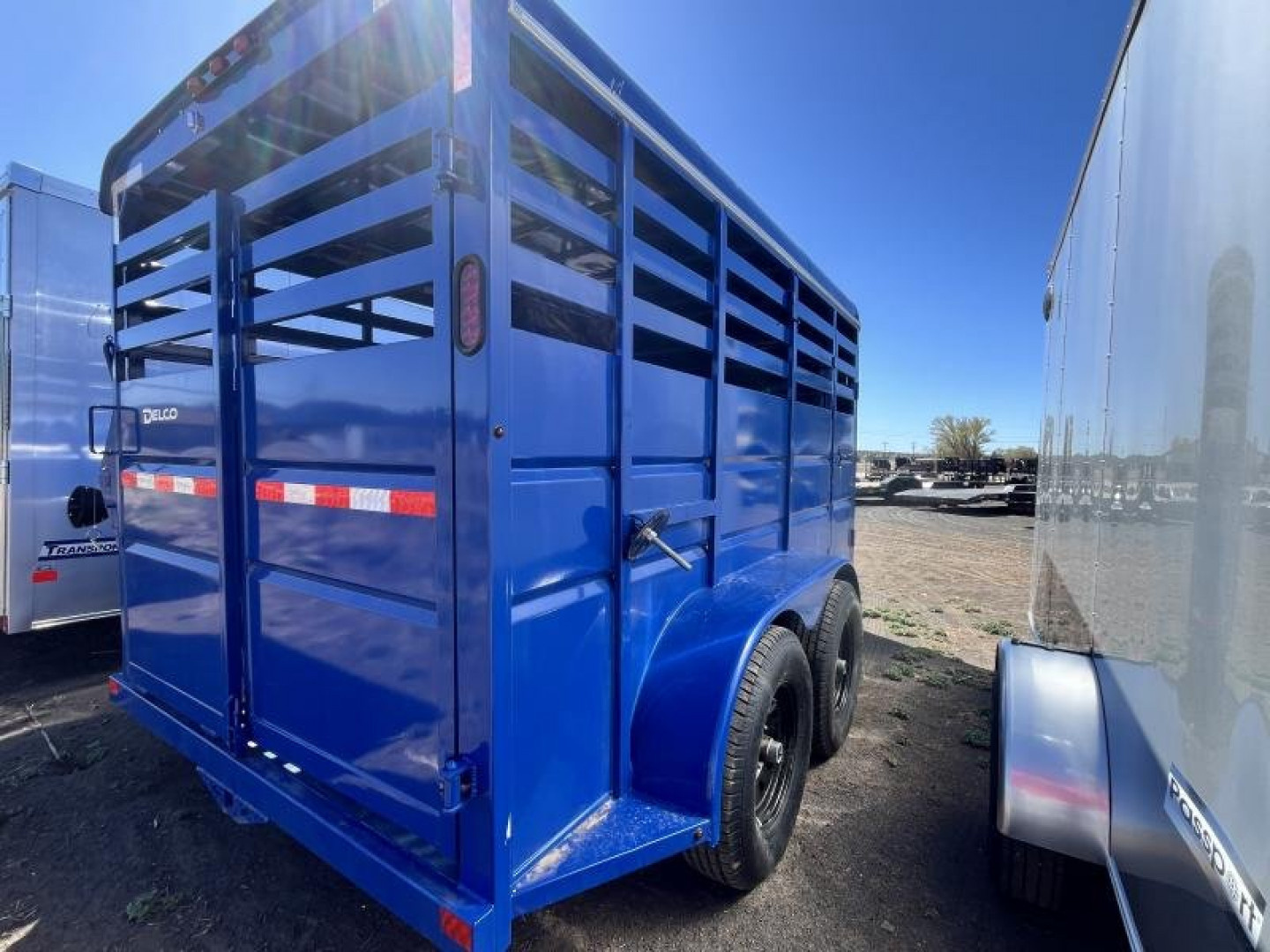 New 2025 Delco Tandem Axle Stock/12,000 GVWR/6'8"x14'