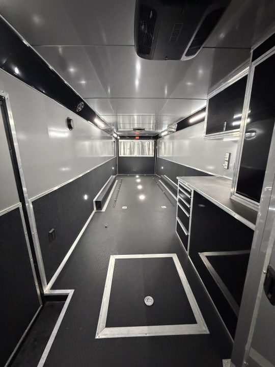 Used 2026 Haulmark 34 EDGE Bathroom Race Trailer, Dual A/C, Airline Track, Winch, 18K GVWR, 54" ALX Slide Out Step, Awning, Air Prep, Landing Light PKG, Hyd Tongue Jack