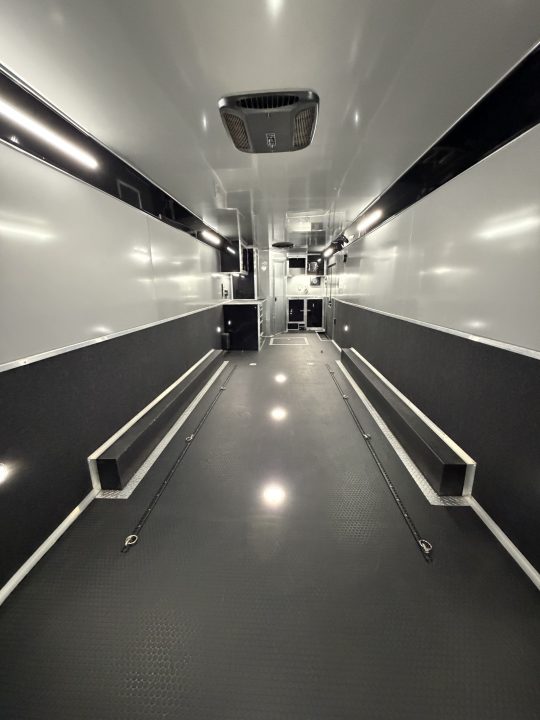 Used 2026 Haulmark 34 EDGE Bathroom Race Trailer, Dual A/C, Airline Track, Winch, 18K GVWR, 54" ALX Slide Out Step, Awning, Air Prep, Landing Light PKG, Hyd Tongue Jack