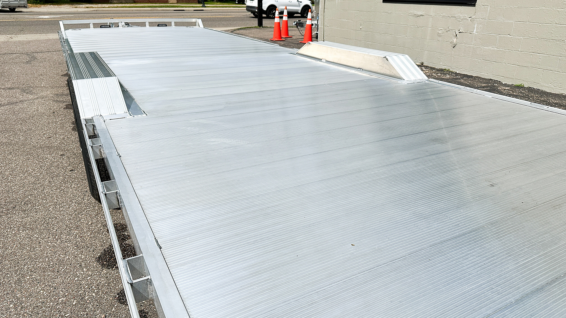 New Aluma Wide Body 10x28 Tandem Axle Equipment Hauler!