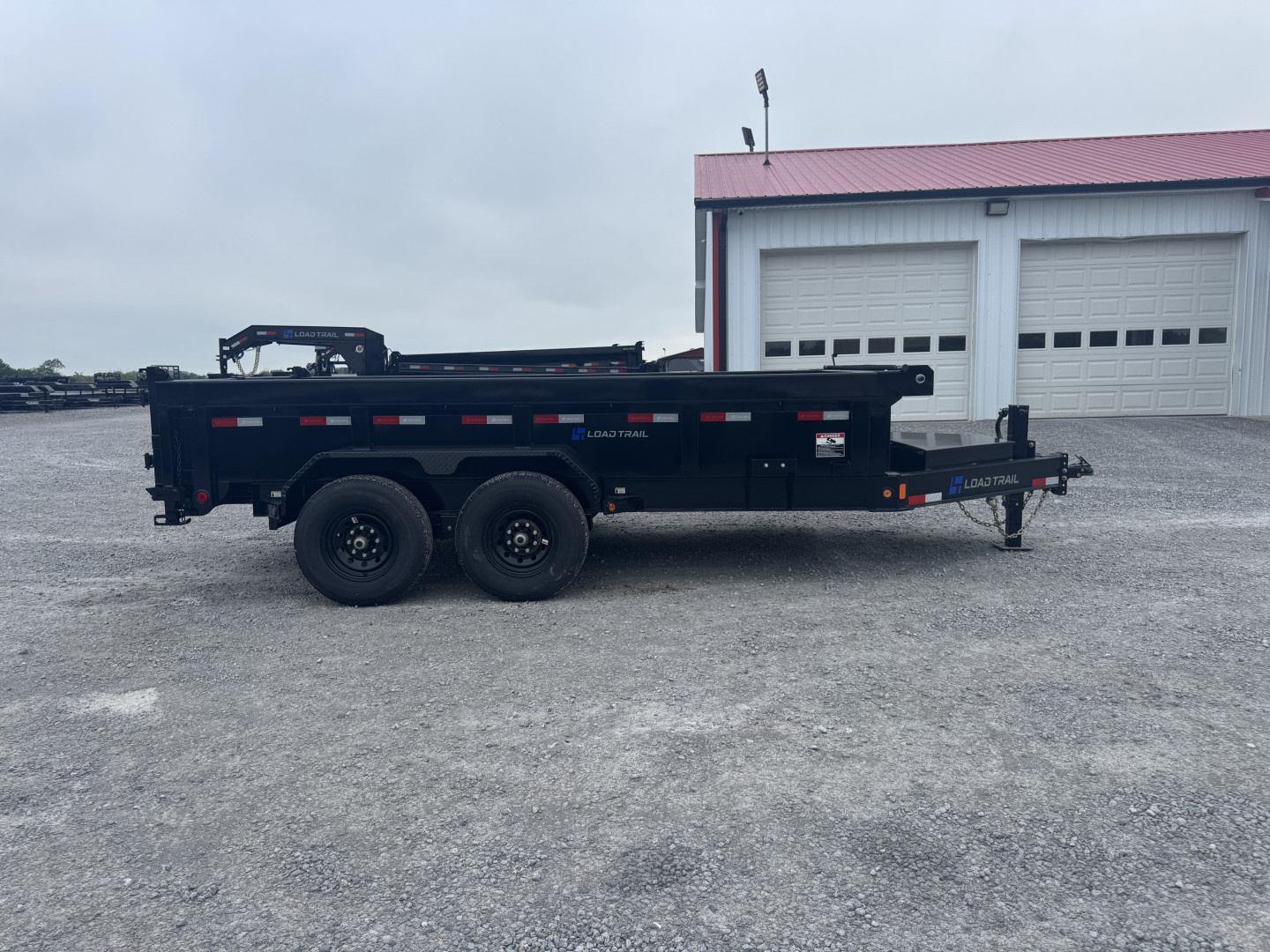 New 2026 Load Trail 83"x14' Scissor Lift Dump Trailer