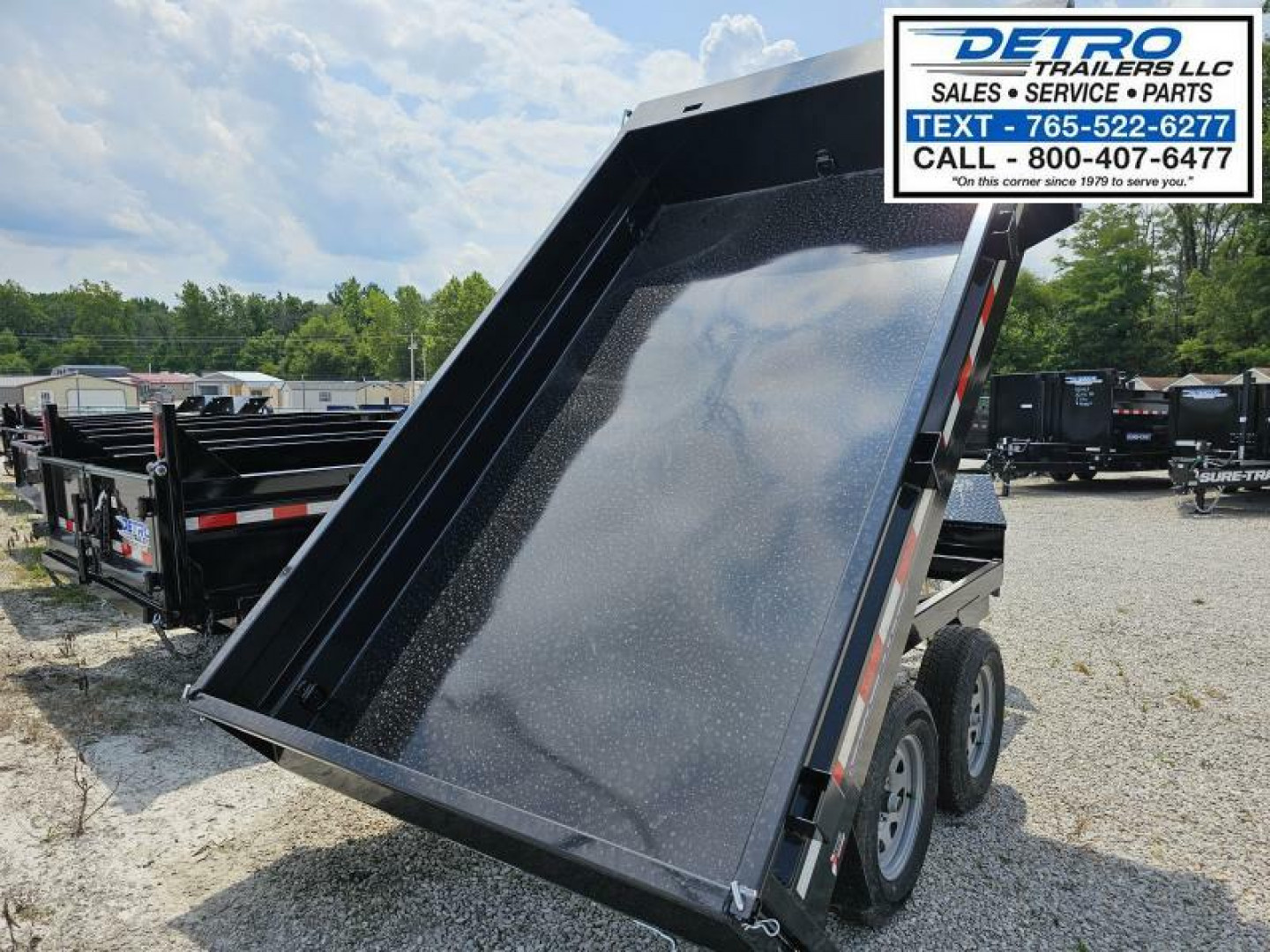 New 2025 Sure-Trac 6' X 10' 7K Single Ram SD Deckover Dump Trailer