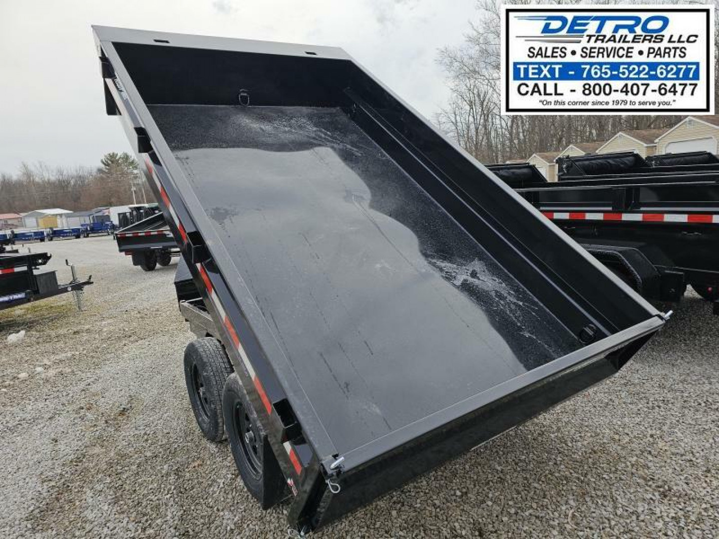 New 2025 Sure-Trac 6' x 10' 7K Single Ram SD Deckover Dump Trailer