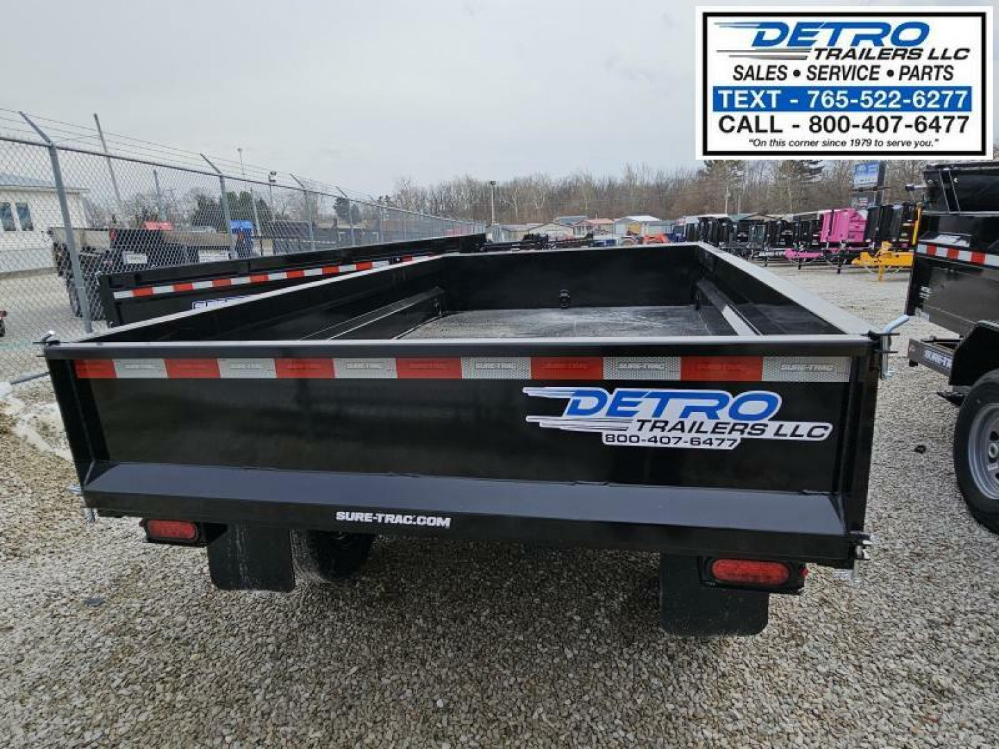 New 2025 Sure-Trac 6' x 10' 7K Single Ram SD Deckover Dump Trailer