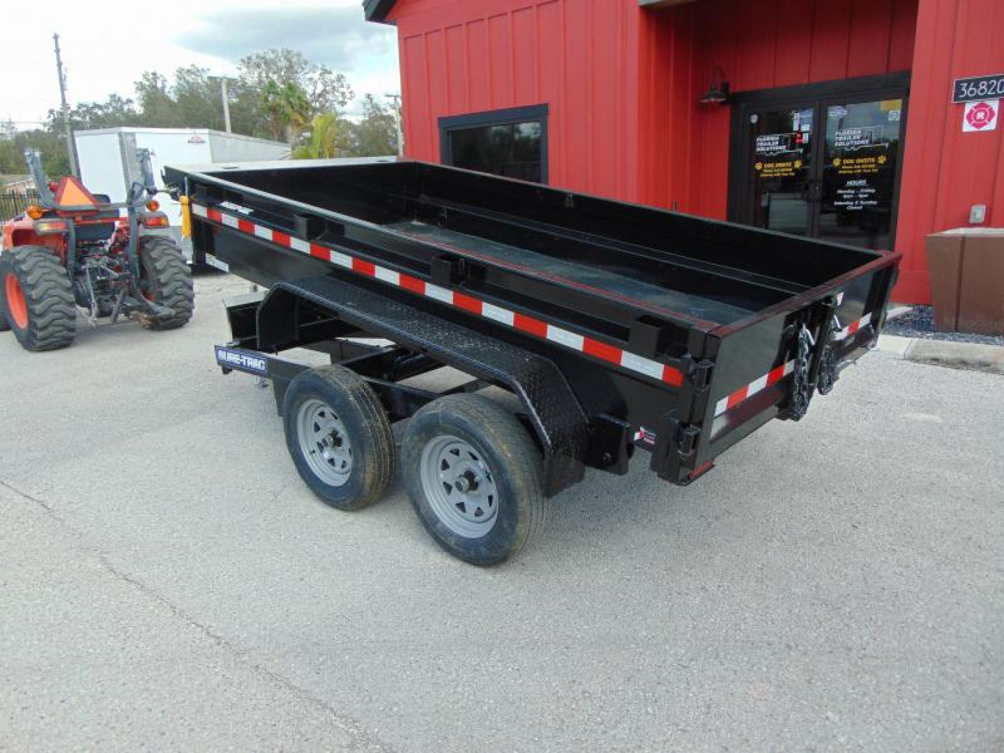 New Sure-Trac 5X10 Low Profile 7k Single Ram Dump Trailer