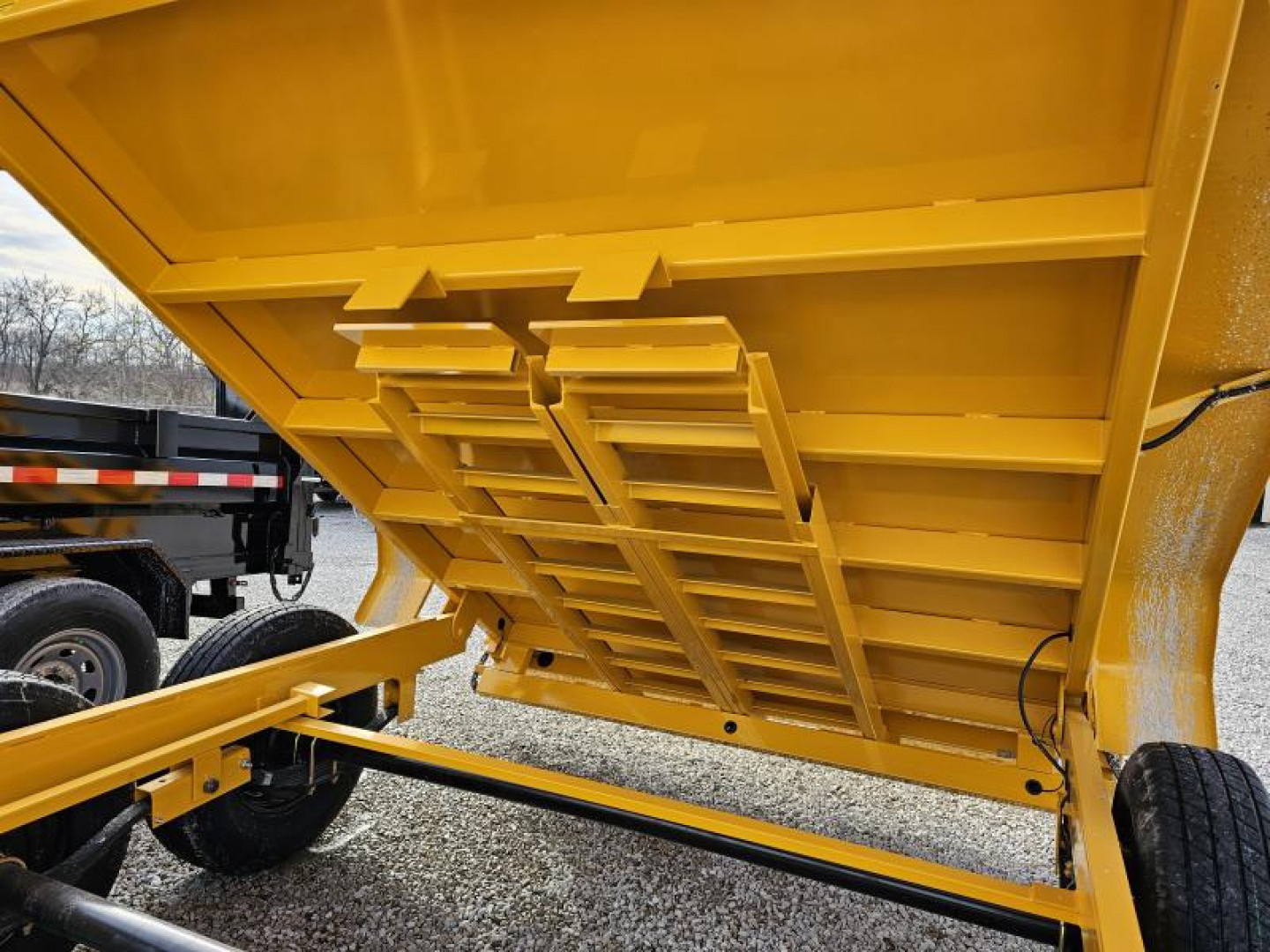 New 2025 CONSTRUCTION YELLOW Sure-Trac 82" x 14' 14K Telescopic HD Low Profile Dump Trailer