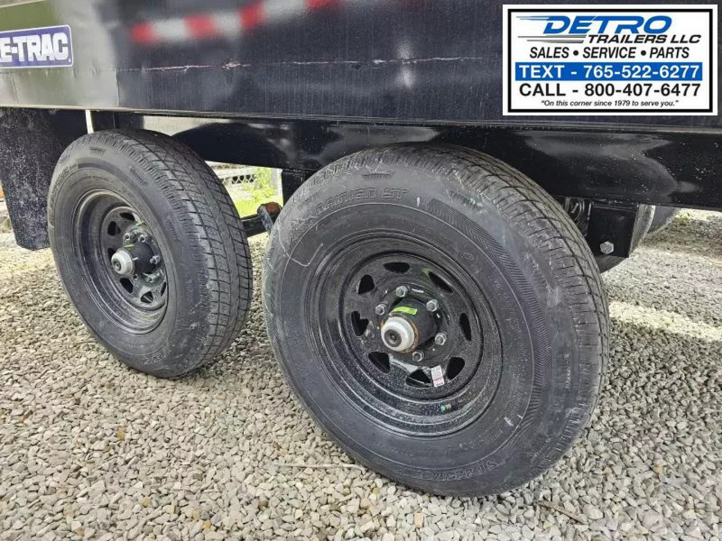 New 2025 Sure-Trac 6' x 10' 10K Single Ram SD Deckover Dump Trailer