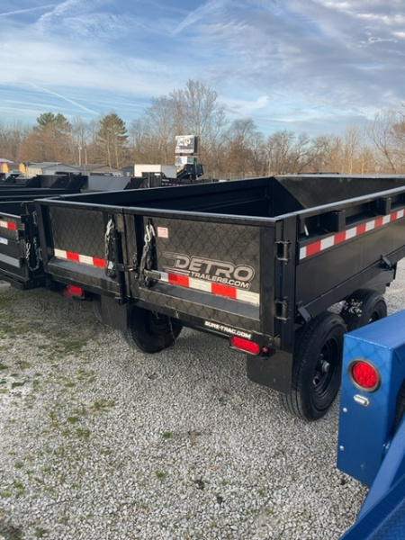 New 2025 Sure-Trac 6' x 10' 10K Single Ram SD Deckover Dump Trailer
